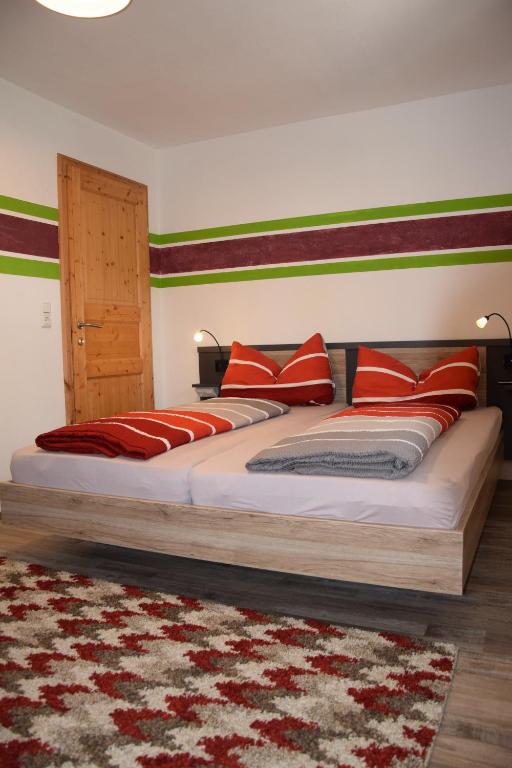 Posteľ alebo postele v izbe v ubytovaní Ferienwohnung Trixl