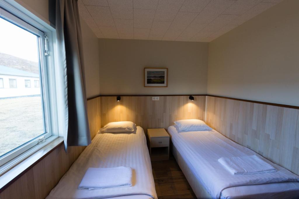 Postel nebo postele na pokoji v ubytování Hotel Skaftafell