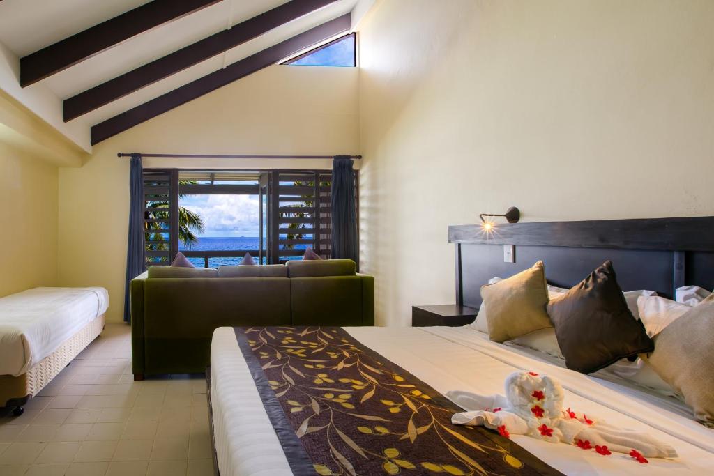 Postel nebo postele na pokoji v ubytování Mana Island Resort & Spa - Fiji