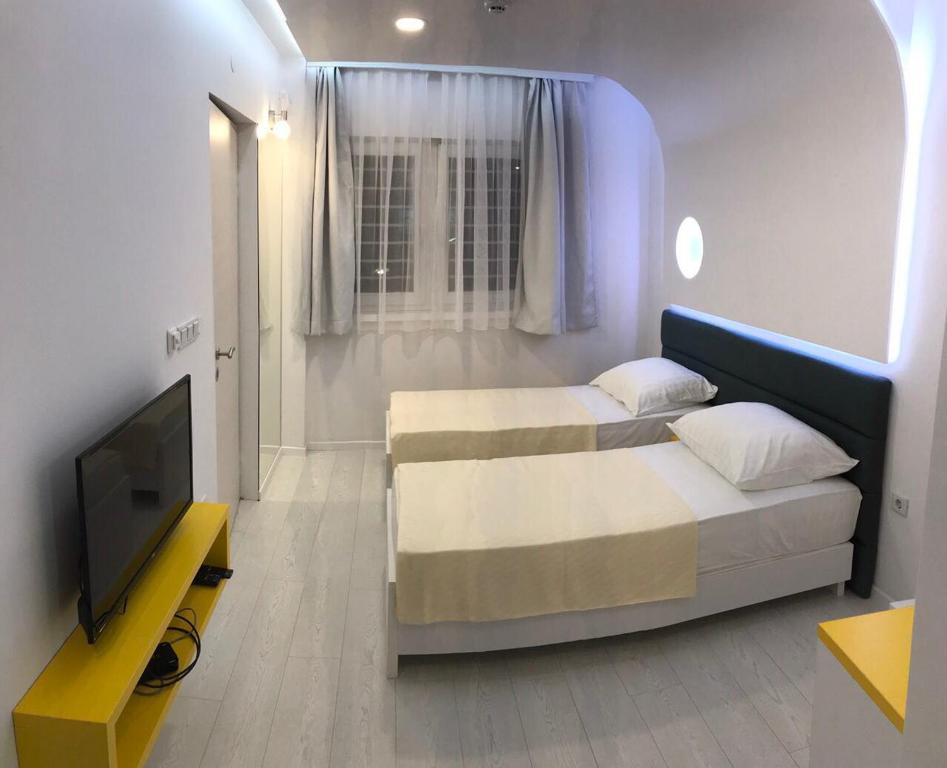 Postel nebo postele na pokoji v ubytování Guesthouse Biser