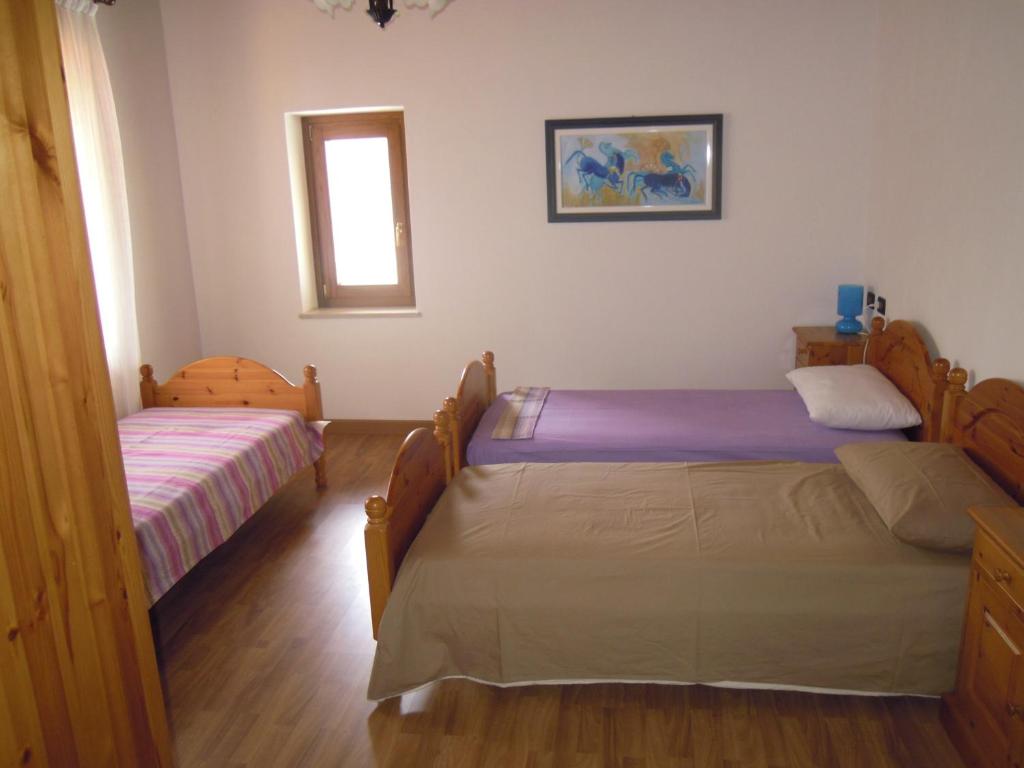 Postel nebo postele na pokoji v ubytování B&B Emma