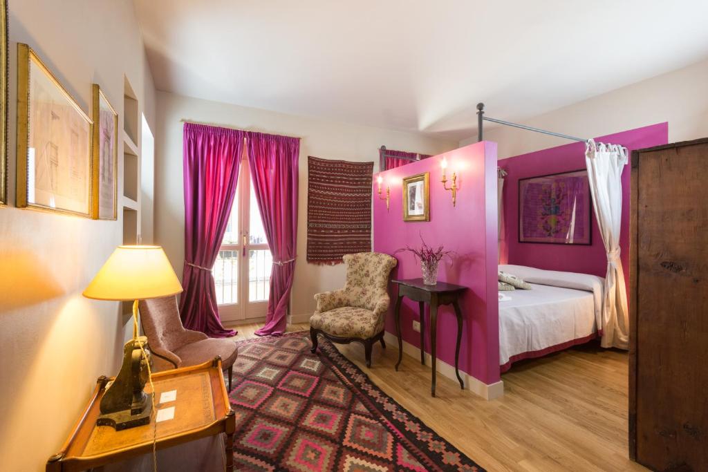 Posteľ alebo postele v izbe v ubytovaní Porta Palace Apartments
