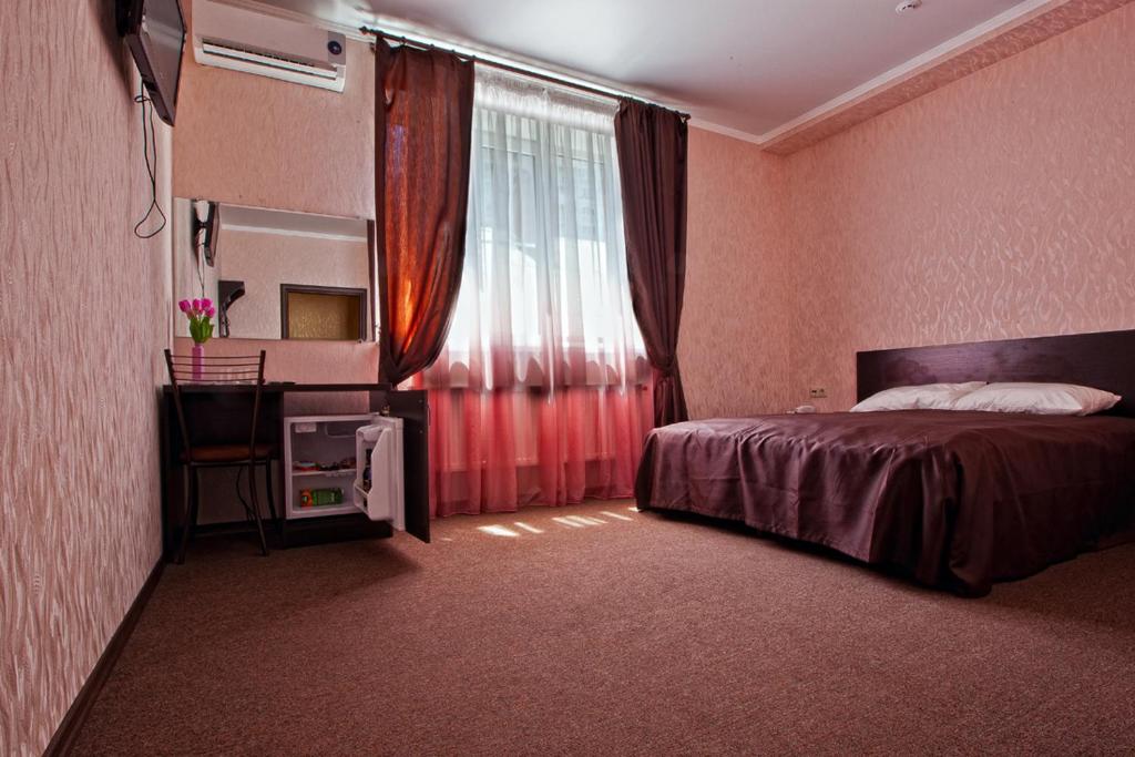 Cama o camas de una habitación en Provans Guest House