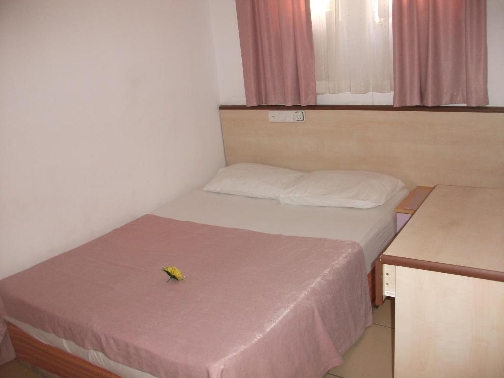 Postel nebo postele na pokoji v ubytování Delphin Apart Hotel