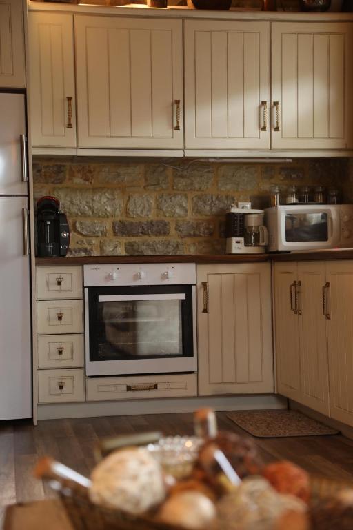 Kuchyňa alebo kuchynka v ubytovaní Guesthouse Amalia