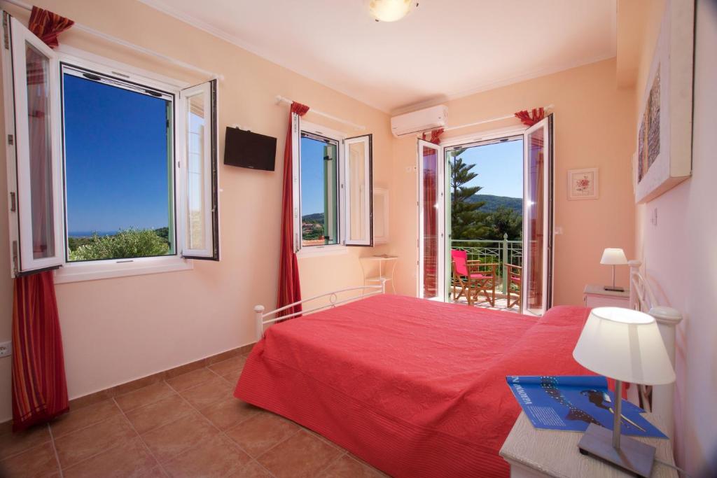 A bed or beds in a room at Villa REGINA