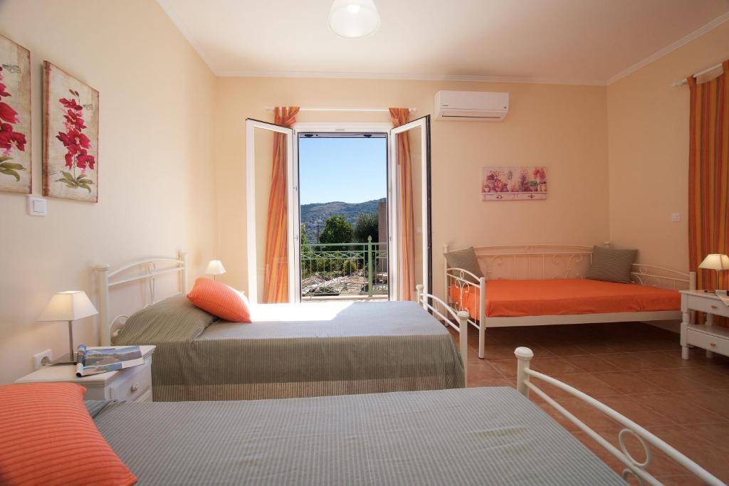 A bed or beds in a room at Villa REGINA