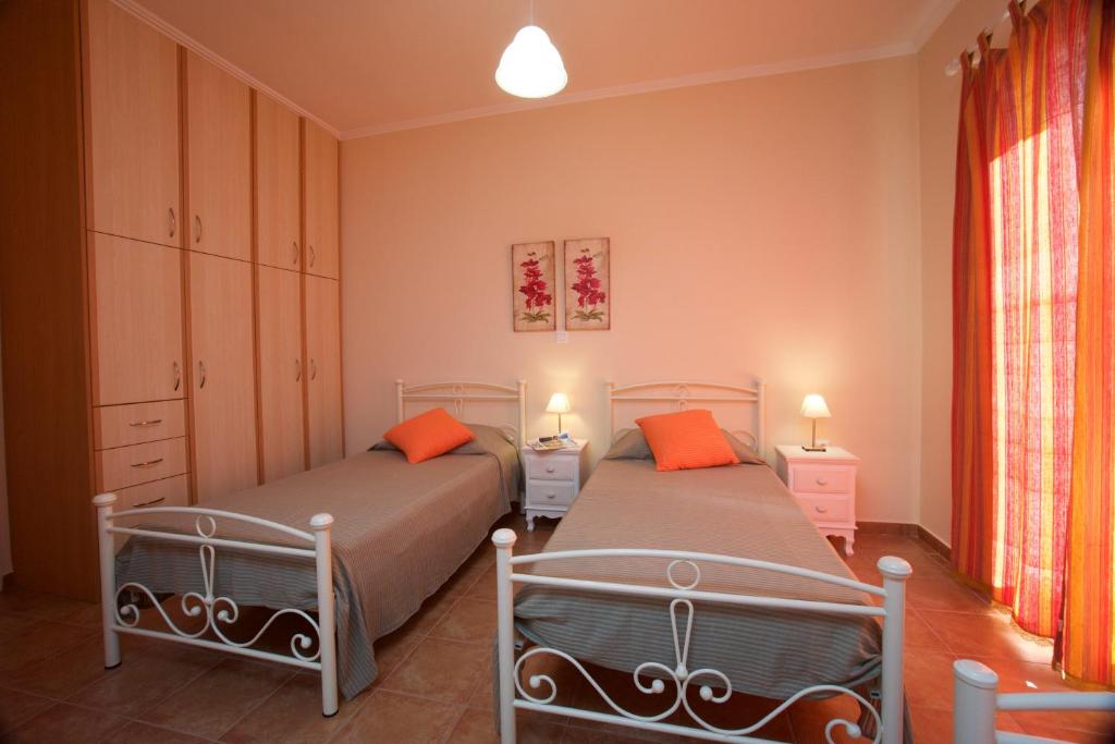 A bed or beds in a room at Villa REGINA