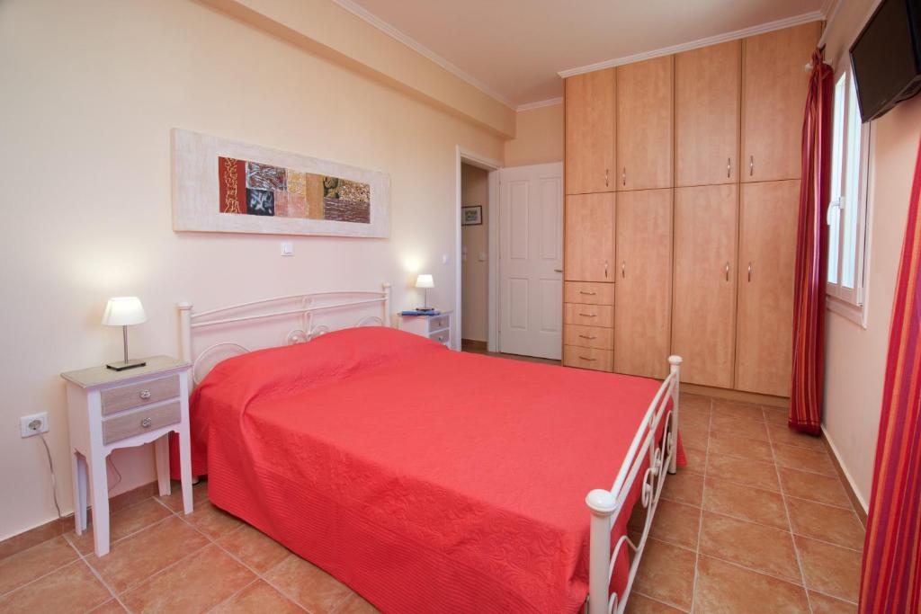 A bed or beds in a room at Villa REGINA