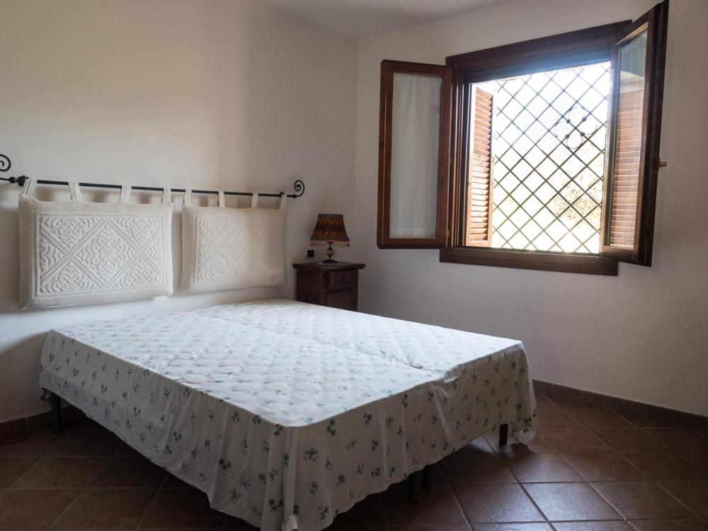 Postelja oz. postelje v sobi nastanitve Residence degli ulivi