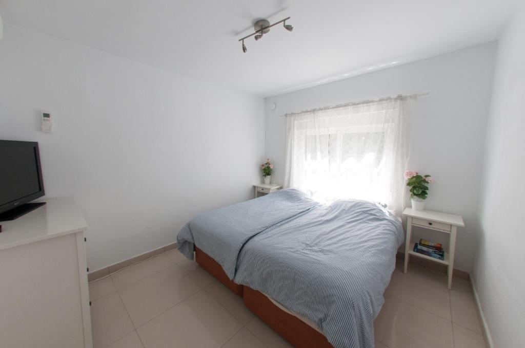 Postel nebo postele na pokoji v ubytování Villa Marysol sleeps 6