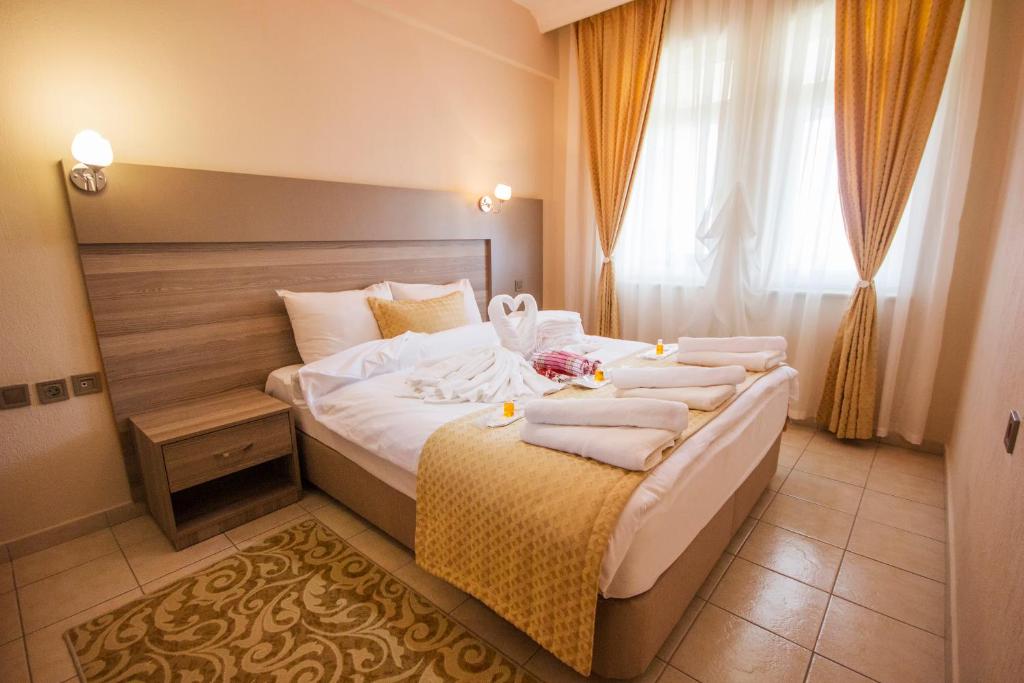Кровать или кровати в номере Basaranlar Thermal Otel