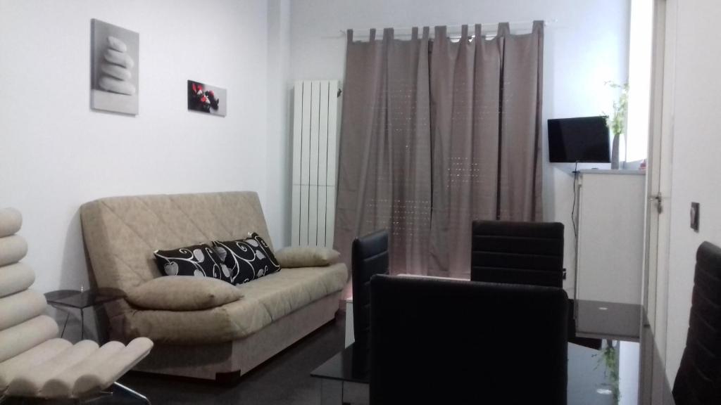 TV a/nebo společenská místnost v ubytování Apartamentos Turísticos Los Ángeles