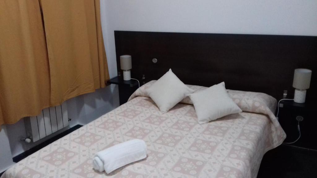 Postel nebo postele na pokoji v ubytování Apartamentos Turísticos Los Ángeles