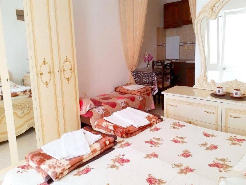 Postel nebo postele na pokoji v ubytování Paradiso Apartments - Liman1
