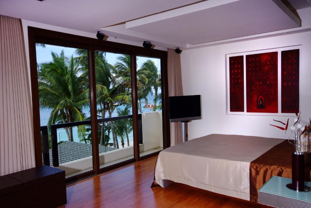 TV a/nebo společenská místnost v ubytování Boracay Beach Houses