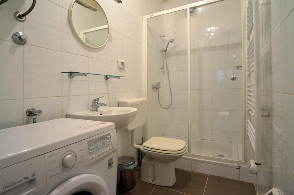 Kúpeľňa v ubytovaní Apartment Il Cortile with garden and parking