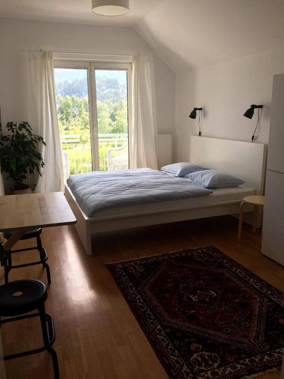 Postel nebo postele na pokoji v ubytování Guest House Vitaja