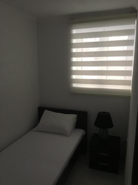 Postel nebo postele na pokoji v ubytování Apartment Apollo