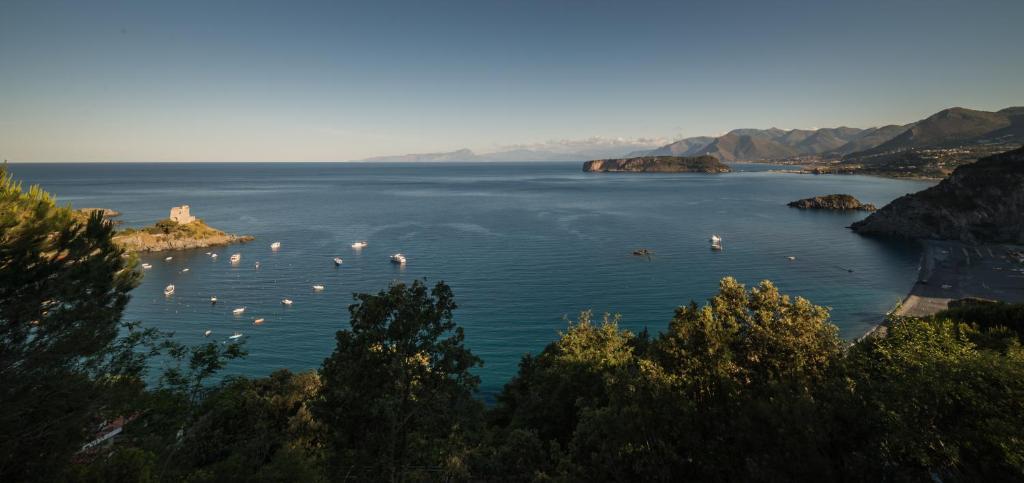 a large body of water with boats in it at Villa Crawford in San Nicola Arcella