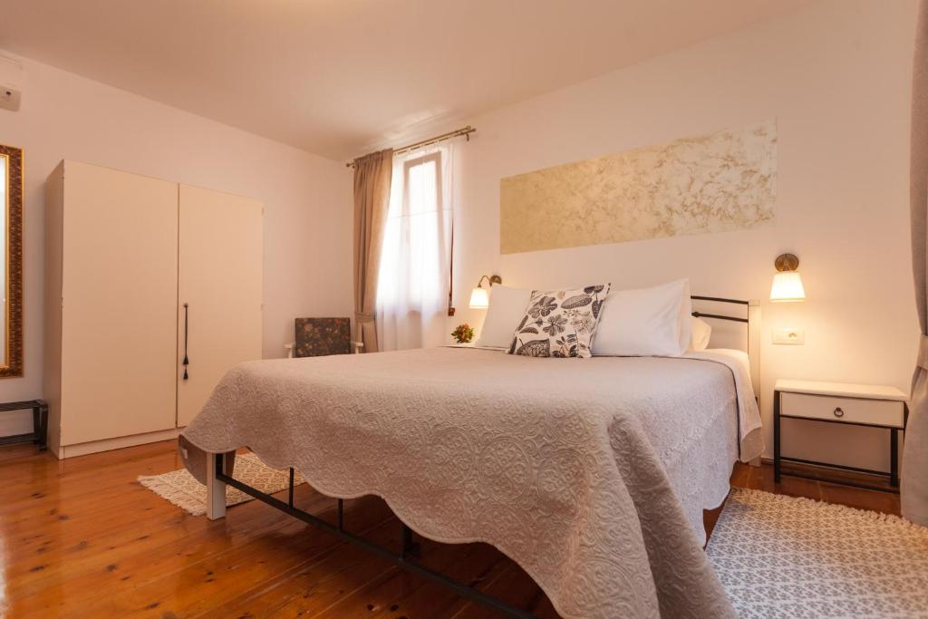 Postel nebo postele na pokoji v ubytování Guesthouse Casa Vittoria