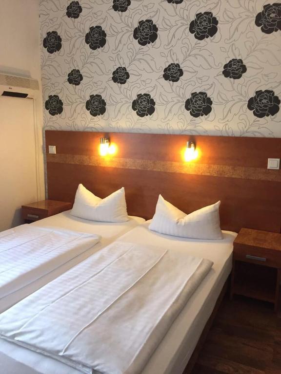 Postel nebo postele na pokoji v ubytování Hotel Monte Cristo