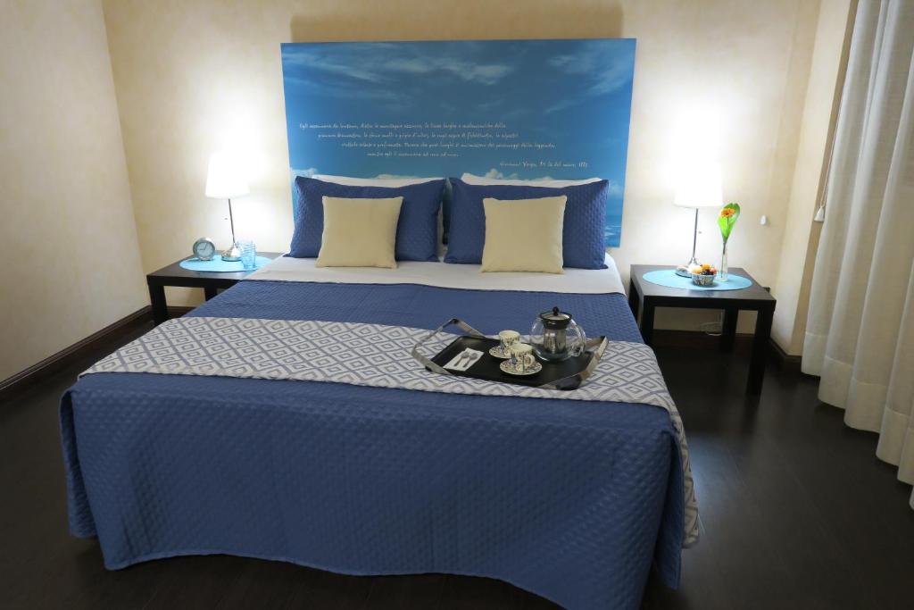 Postel nebo postele na pokoji v ubytování Mare Nostrum Petit Hôtel