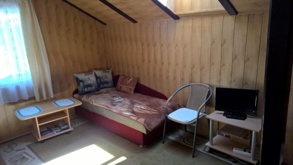Postel nebo postele na pokoji v ubytování Apartament na Wrzosach