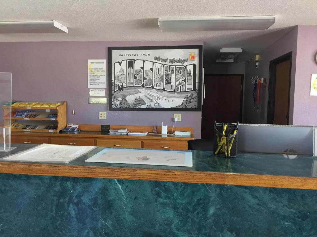 a counter in a room with a counter top at Super 8 by Wyndham Sweet Springs in Sweet Springs