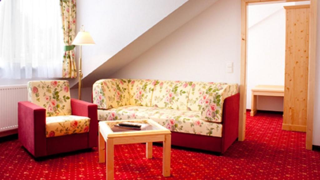 Posezení v ubytování Elbhotel Bad Schandau