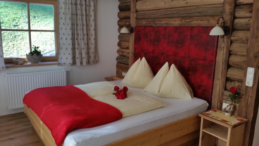 Łóżko lub łóżka w pokoju w obiekcie Pension Hedegghof