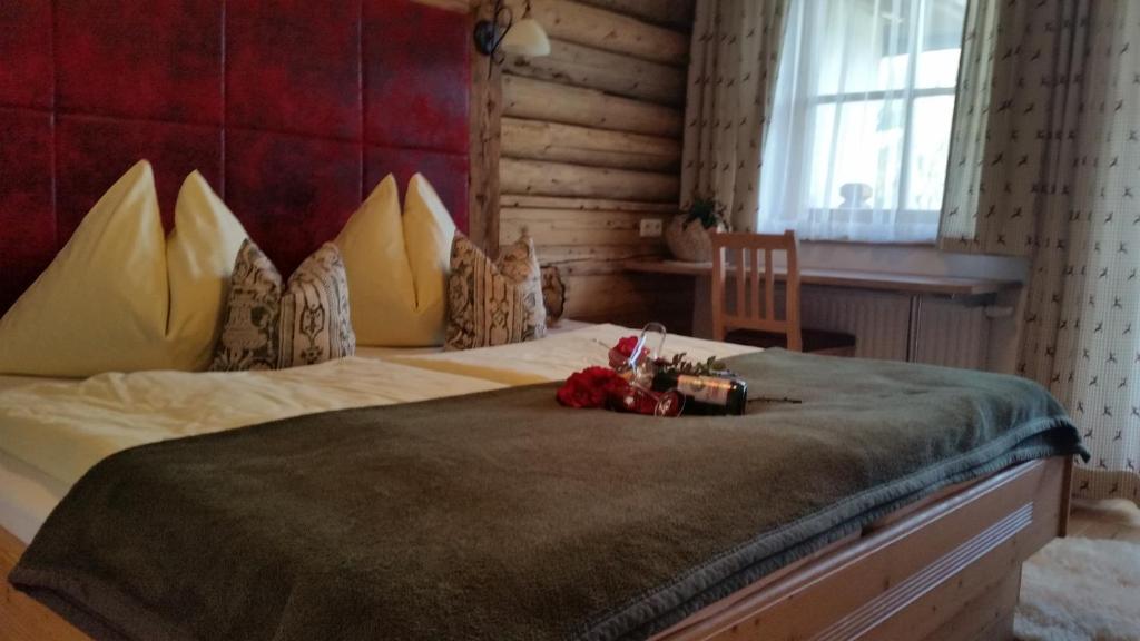 Łóżko lub łóżka w pokoju w obiekcie Pension Hedegghof