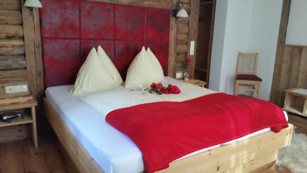 Łóżko lub łóżka w pokoju w obiekcie Pension Hedegghof