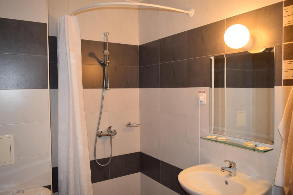 Koupelna v ubytování Hotel Eva