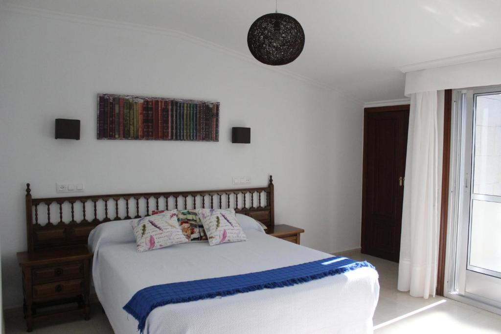 Postel nebo postele na pokoji v ubytování Hotel Estrella del Mar