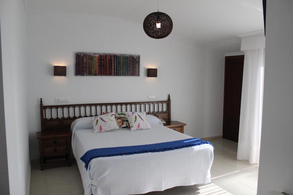 Postel nebo postele na pokoji v ubytování Hotel Estrella del Mar