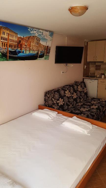 Postel nebo postele na pokoji v ubytování Apartments Bellavista