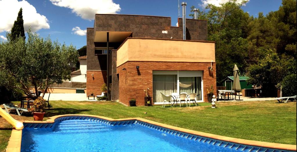 Bazén v ubytovaní Can Vinyals Holiday Home alebo v jeho blízkosti
