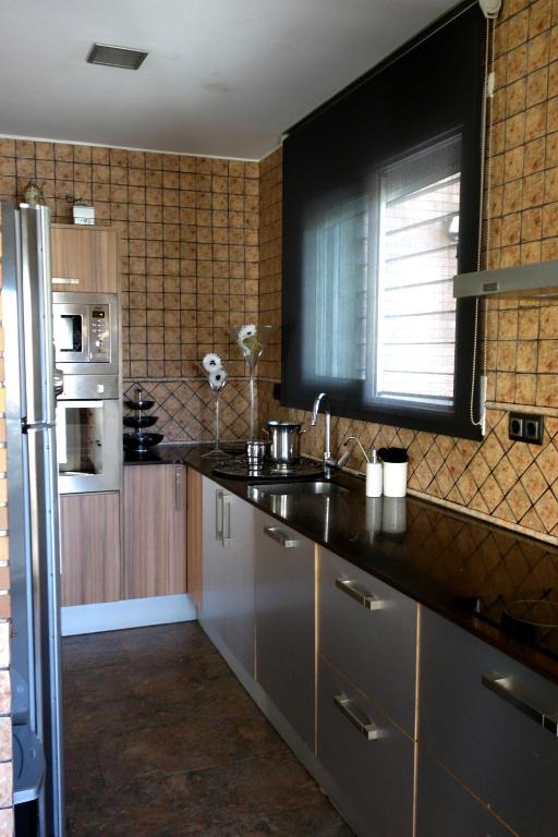 Kuchyňa alebo kuchynka v ubytovaní Can Vinyals Holiday Home