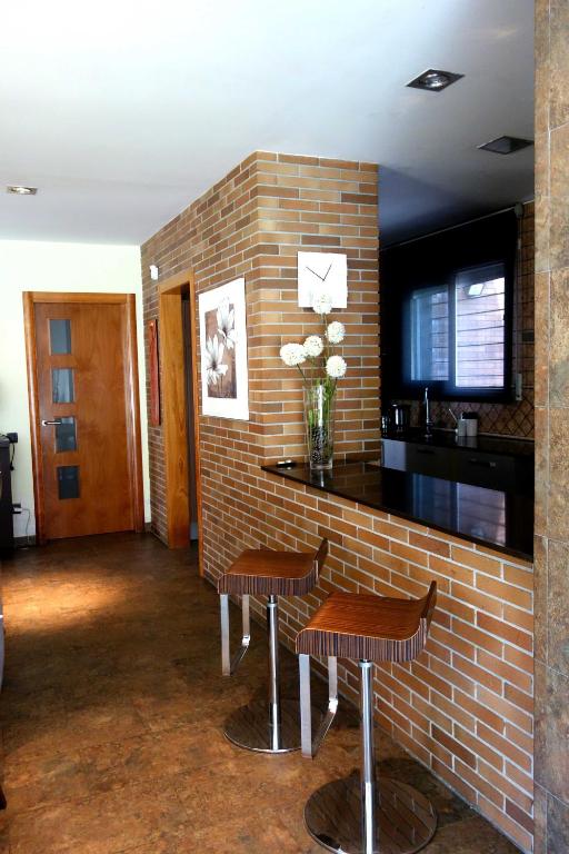 Televízia a/alebo spoločenská miestnosť v ubytovaní Can Vinyals Holiday Home