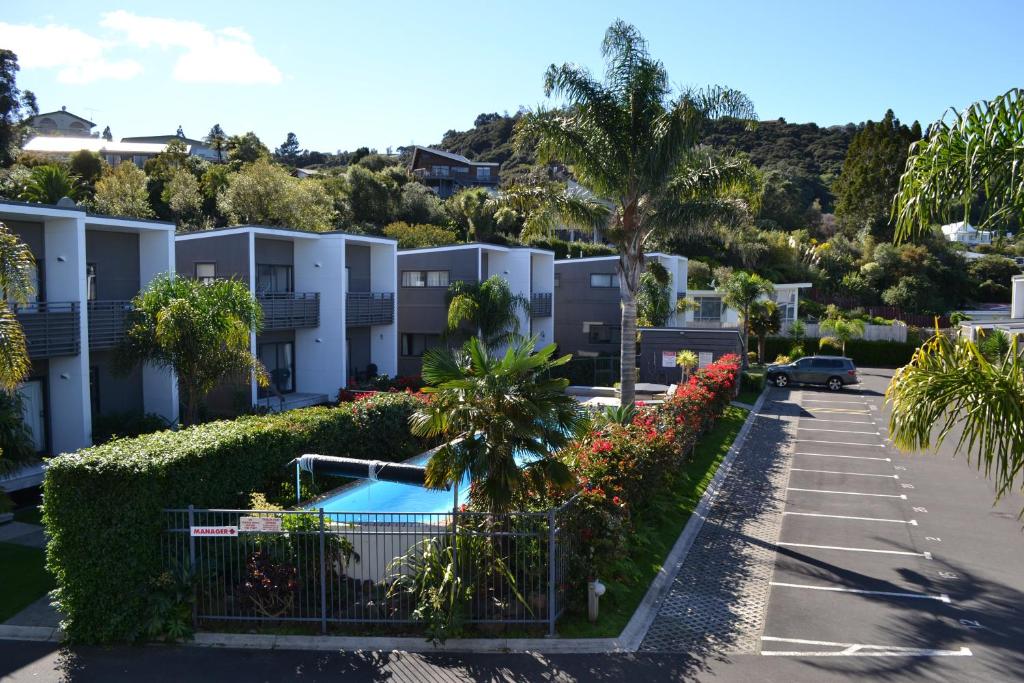 arial view of a parking lot with a apartment complex at Aqua Soleil Villas in Whitianga