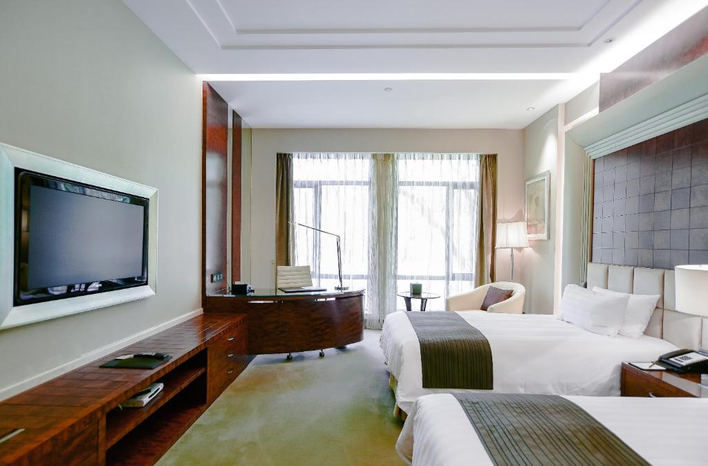 TV a/nebo společenská místnost v ubytování Xijiao State Guest Hotel