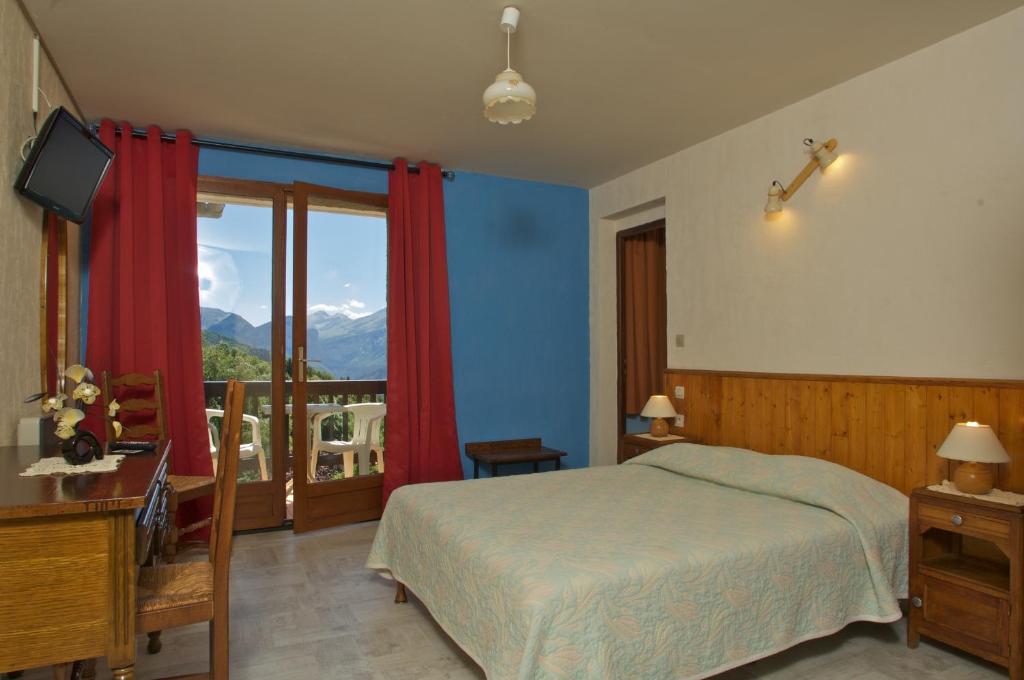 Postel nebo postele na pokoji v ubytování Boustigue Hotel