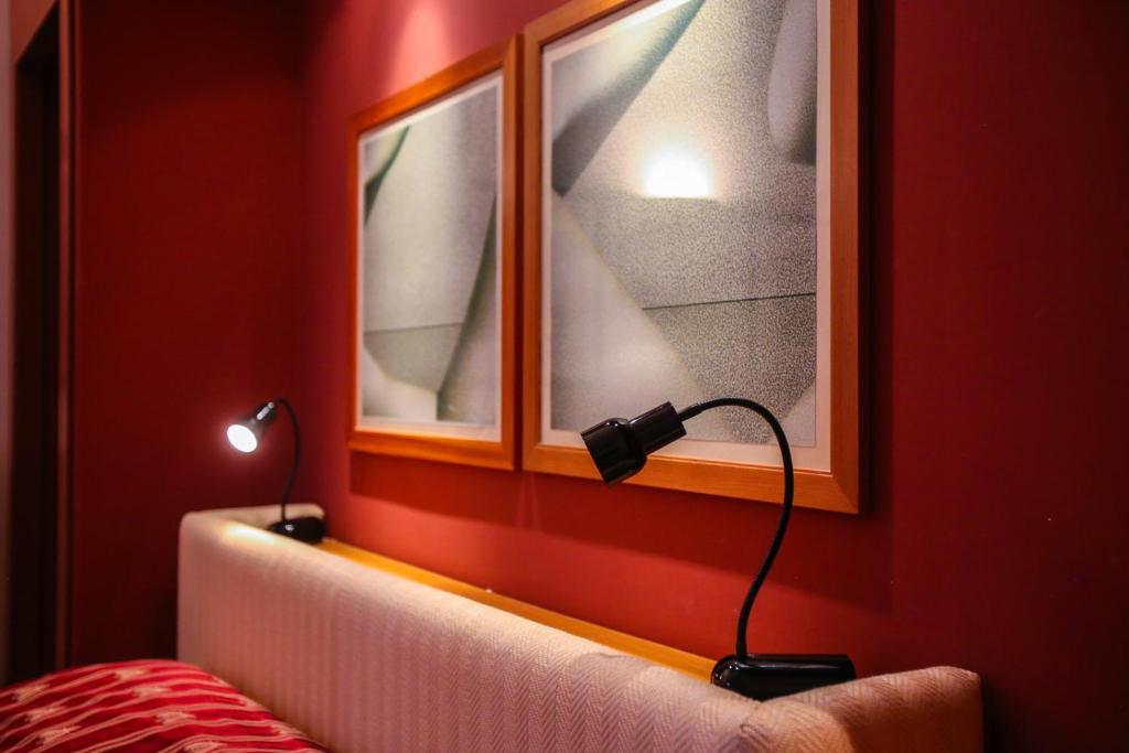 Postel nebo postele na pokoji v ubytování L'Orangerie di Cartia Giovanni