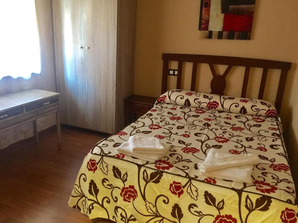 Postel nebo postele na pokoji v ubytování Hosteria Verahouse