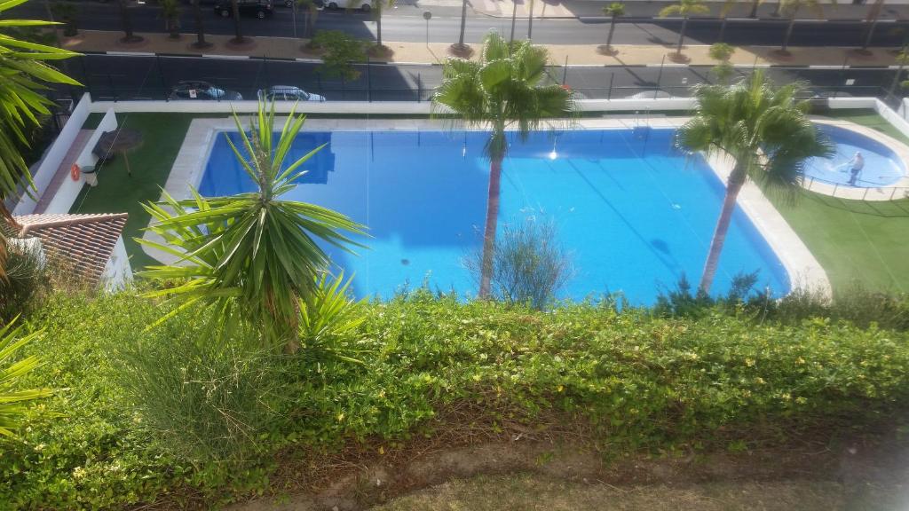 Bazén v ubytovaní Puerto Deportivo Estepona alebo v jeho blízkosti