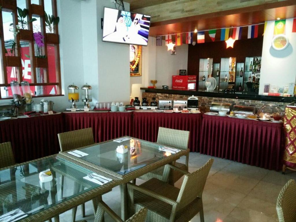 Restaurace v ubytování Grand La Walon Hotel