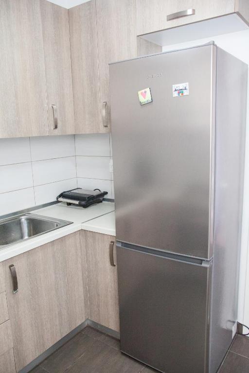Kuchyň nebo kuchyňský kout v ubytování Sea view appartment in Geoponika