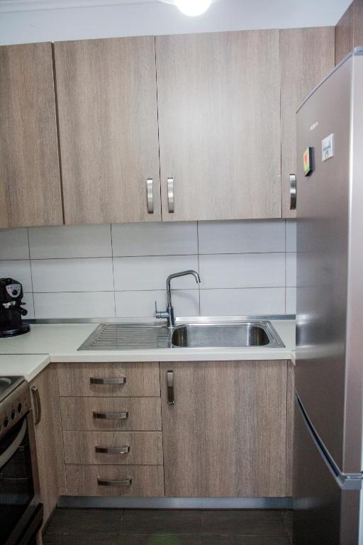Kuchyň nebo kuchyňský kout v ubytování Sea view appartment in Geoponika