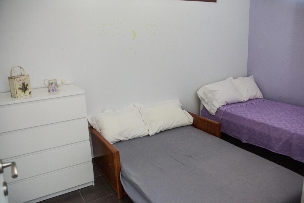 Postel nebo postele na pokoji v ubytování Sea view appartment in Geoponika